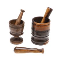 TREEN: A 19TH CENTURY LIGNUM VITAE PESTLE AND MORTAR.