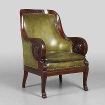 A 19TH CENTURY GREEN LEATHER MAHOGANY LIBRARY ARMCHAIR.