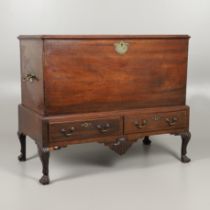 A 19TH CENTURY MAHOGANY DOWER CHEST ON STAND.