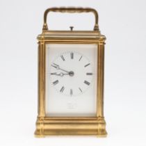 AN 19TH CENTURY BRASS REPEATING CARRIAGE CLOCK.