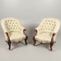 A PAIR OF MAHOGANY SHOW FRAME BUTTON BACK ARMCHAIRS.