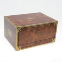 A 19TH CENTURY ROSEWOOD AND BRASS BOUND VANITY BOX.