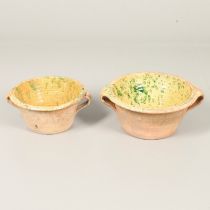 A 19TH CENTURY POTTERY DAIRY TWO HANDLED BOWL.