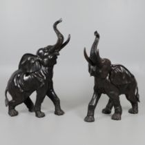 A PAIR OF LARGE BRONZE ELEPHANTS.