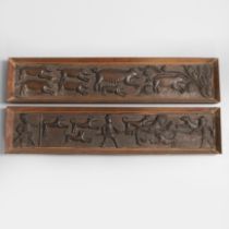 A PAIR OF 17TH CENTURY CONTINENTAL CARVED PANELS.
