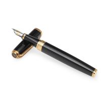 A WATERMAN 'IDEAL' BLACK AND GILT METAL CASED FOUNTAIN PEN.