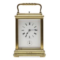 A LARGE MID 19TH CENTURY BRASS REPEATING CARRIAGE CLOCK.