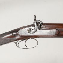 A FINE 19TH CENTURY 12 BORE SPORTING GUN BY SQUIRES OF LONDON.
