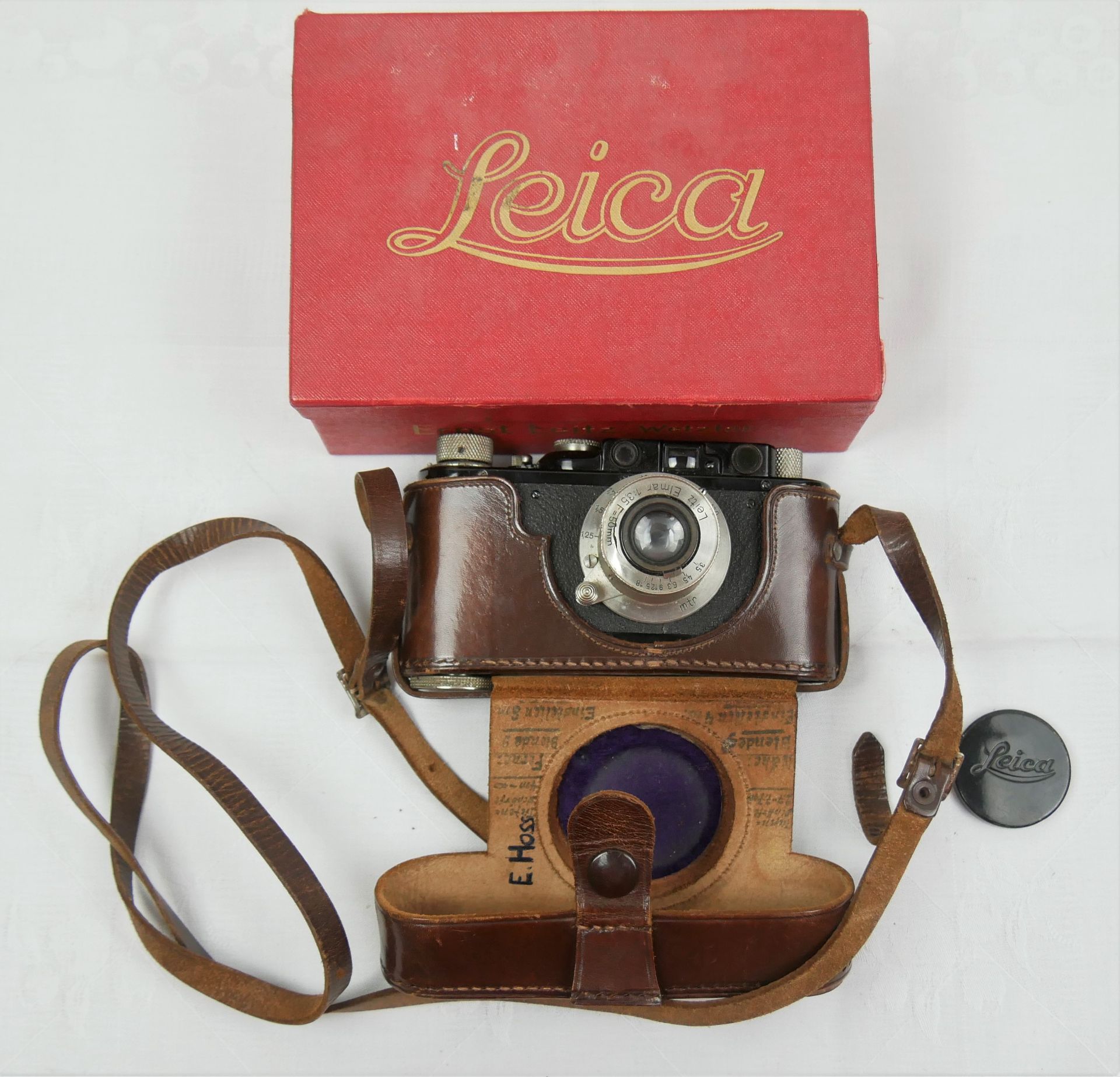 Leica Kamera Ernst Leitz Wetzlar D.R.F. No. 96727, Objektiv aussen beschädigt. In der Original