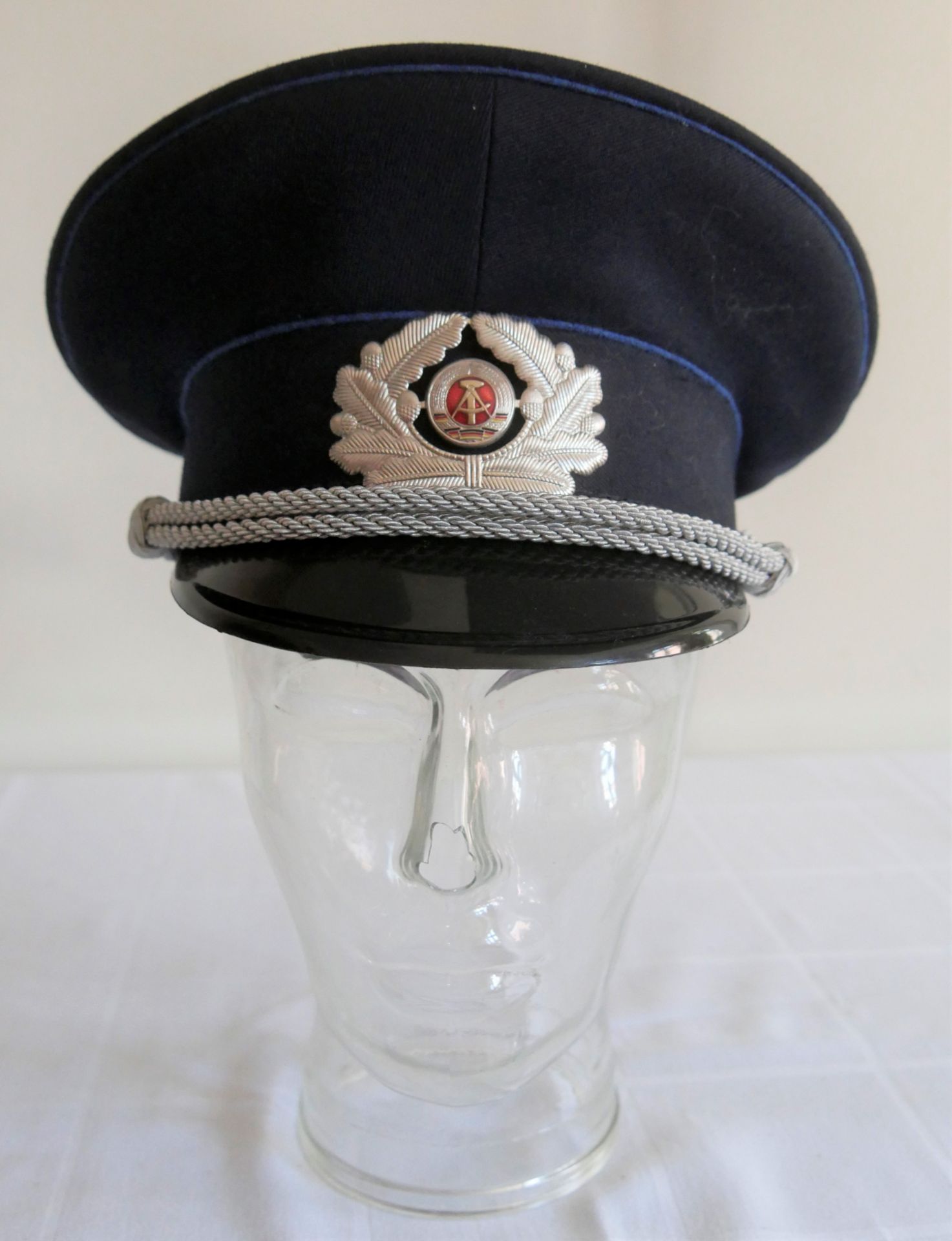 Aus Sammelauflösung! Uniformmütze / Schirmmütze NVA Offizier MdI 1856 H. Größe 57, in blau, guter