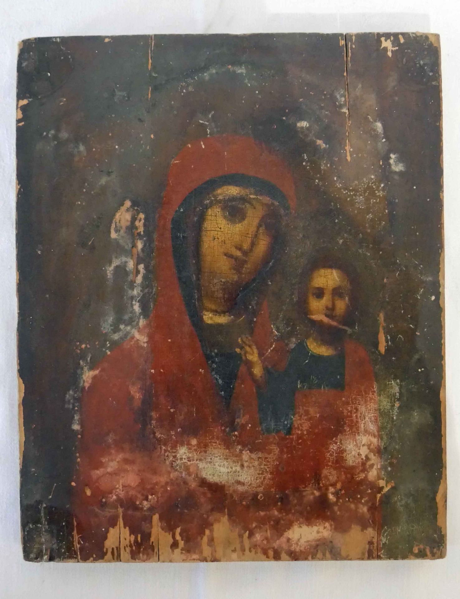 Eine alte Ikone auf Holzplatte "Gottesmutter mit Jesukind", teilweise Farbverlust. Maße: Höhe ca. 27