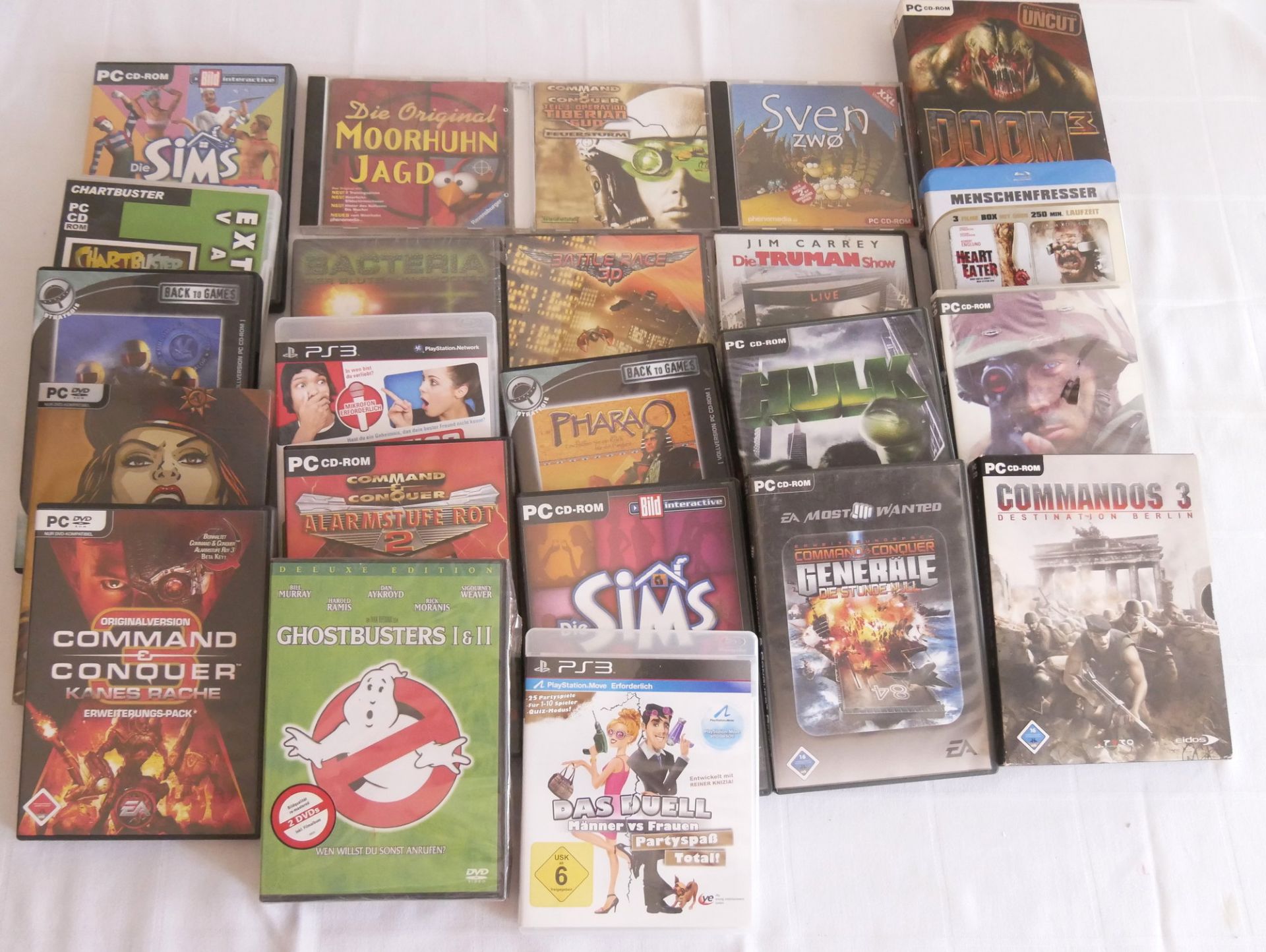 Lot DVD´s und Computerspiele, teilweise noch Original verpackt.