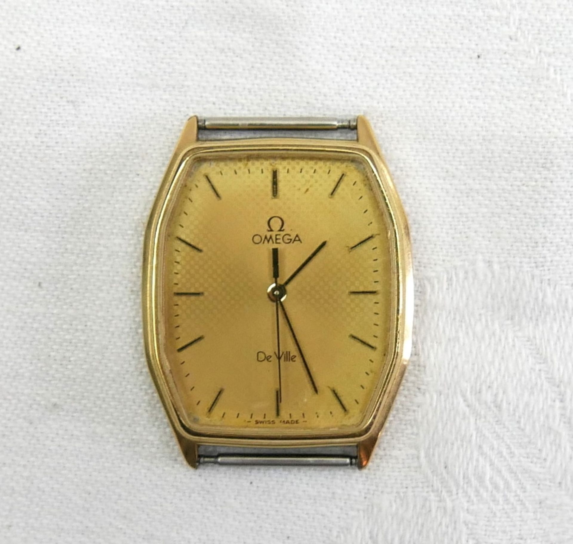Herrenarmbanduhr OMEGA de Ville "Lster AG 45 Jahre", für den Uhrmacher. Krone fehlt.
