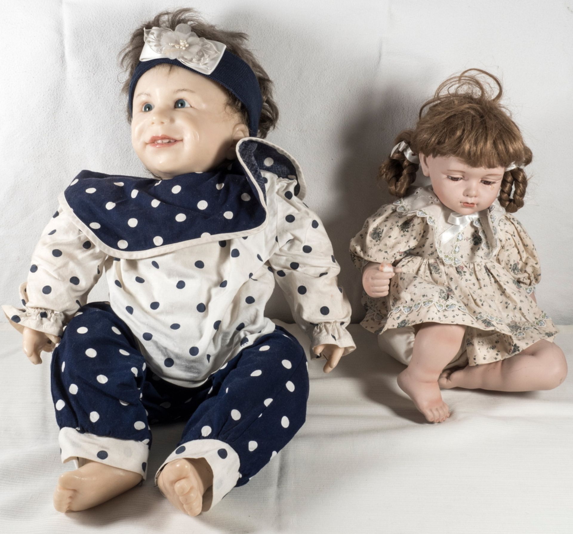 Zwei Puppen: 1 x Soff / Kunststoff, Höhe: ca. 58 cm, 1 x "Anni", aus der Annabell Collection 1991.