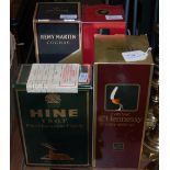 FOUR BOXED BOTTLES OF ASSORTED COGNAC TO INCLUDE TWO REMY MARTIN, ONE HENNESSEY AND ONE HINE VSOP