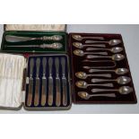 THREE CASED SETS TO INCLUDE A CASED SET OF TWELVE SILVER TEASPOONS AND TONGS WITH BRIGHT CUT DETAIL,