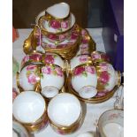 A PART ROYAL ALBERT TEA SET WITH WHITE, GILT AND PINK ROSE DETAIL