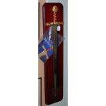 A REPRODUCTION SWORD OF IVANHOE, MOUNTED ON MAHOGANY PLAQUE