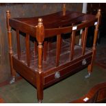 A REPRODUCTION MAHOGANY THREE DIVISION CANTERBURY AND A STAINED WOOD RECTANGULAR STOOL WITH CANEWORK