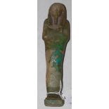 AN EGYPTIAN SHABTI FIGURE WITH TRACES OF BLUE-GREEN GLAZE, REVERSE WITH INCISED HIEROGLYPHICS