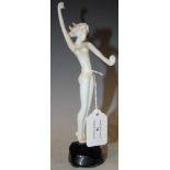 AN ART DECO STYLE OPAQUE WHITE GLASS AND BLACK GLASS FIGURE OF A STANDING FEMALE NUDE