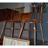 A PAIR OF STAINED BEECH SPINDLE BACK SIDE CHAIRS