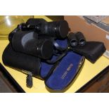 A CASED SET OF BINOCULARS AND A PRAKTICA 8 BY 21S PAIR OF BINOCULARS