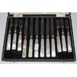 A CASED SET OF SIX SHEFFIELD SILVER AND MOTHER OF PEARL HANDLED FRUIT KNIVES AND FORKS