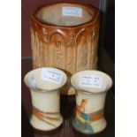 A PAIR OF MINIATURE CROWN DEVON ART DECO STYLE POTTERY VASES, EACH DECORATED WITH A PAIR OF LONG-