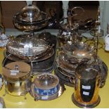 A COLLECTION OF PLATED WARES TO INCLUDE A TWIN-HANDLED SERVING TRAY, BISCUIT BARREL, WINE BOTTLE
