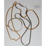 AN ITALIAN 9CT GOLD NECKLACE, A 9CT GOLD BRACELET, AND A BI-COLOUR WHITE AND YELLOW METAL NECKLACE