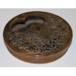 AN 18TH/ 19TH CENTURY CARVED HORN SNUFF BOX OF CIRCULAR FORM WITH REVOLVING COVER, WITH CARVED