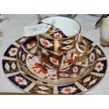 THREE PIECES OF ROYAL CROWN DERBY IMARI PATTERN TEAWARE, COMPRISING MOUSTACHE CUP, SAUCER, AND