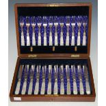 A CASED SET OF TWELVE ELECTROPLATED AND MOTHER OF PEARL HANDLED FRUIT KNIVES AND FORKS