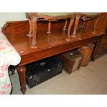 A 19TH CENTURY MAHOGANY HALL TABLE / SERVING TABLE WITH GALLERY BACK RAISED ON FOUR TURNED