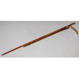 A SILVER MOUNTED HORN-HANDLED RIDING CROP, AND A VINTAGE SWAGGER STICK MERCHISTON CASTLE OTC
