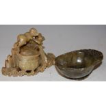 A CHINESE CARVED SOAPSTONE LIBATION CUP AND A CHINESE CARVED SOAPSTONE WATER POT WITH CARVED