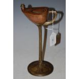 AN ART NOUVEAU COPPER AND BRASS OIL BURNING LAMP STAMPED 'E. HUECK NO. 2024'
