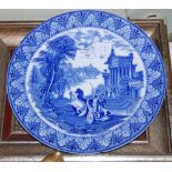 A CAULDON BLUE AND WHITE CAKE PLATE DEPICTING A CHARIOT, TOGETHER WITH TWO FRAMED MILITARY PRINTS