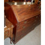 A GEORGE III MAHOGANY AND BOXWOOD LINED BUREAU WITH CHECKER-BANDED DETAIL