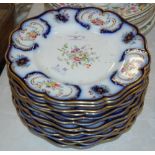 A SET OF THIRTEEN VICTORIAN TRANSFER PRINTED AND HAND COLOURED BLUE AND WHITE DESSERT PLATES WITH