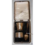 A CASED BIRMINGHAM SILVER EGG, SPOON AND NAPKIN RING SET