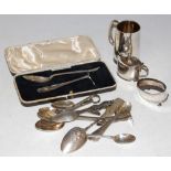 A COLLECTION OF ASSORTED SILVER FLATWARE, TWO SILVER CRUETS AND A SILVER CHRISTENING MUG