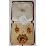A SUITE OF LATE 19TH CENTURY YELLOW METAL AND CITRINE SET JEWELLERY, COMPRISING BROOCH AND PAIR OF