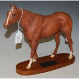 A BESWICK FIGURE 'GRUNDY, RACEHORSE OF THE YEAR 1975', A CONNOISSEUR MODEL ON OVAL PLINTH BASE