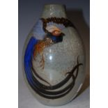 A ROYAL DOULTON TITANIAN VASE DECORATED WITH A LONG TAILED BIRD