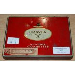 A VINTAGE CRAVEN A CIGARETTE TIN, CONTAINING VARIOUS POSTCARDS TO INCLUDE A WOVEN RAMC GREAT WAR