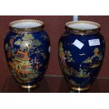 A PAIR OF CARLTON WARE BLUE GROUND CHINOISERIE DECORATED VASES, 20CM HIGH