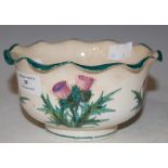 A WEMYSS POTTERY BOWL WITH FRILLED RIM AND THISTLE DECORATION, IMPRESSED MARKS