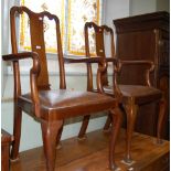 A PAIR OF EARLY 20TH CENTURY MAHOGANY ELBOW CHAIRS WITH DROP-IN LEATHER UPHOLSTERED SEATS